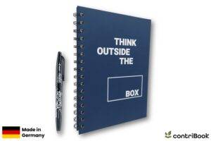 Innovatives Notizbuch mit "Think outside the box" Aufdruck.